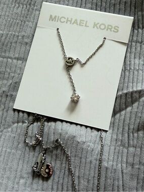 Michael Kors Silver Logo Y-Drop Necklace and bracelet